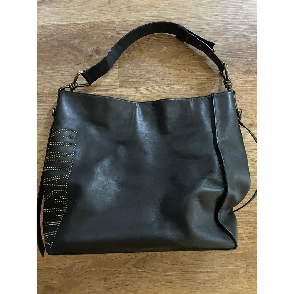 ALL SAINTS Nina North-South Leather Tote Bag Black w/signature metallic studs.